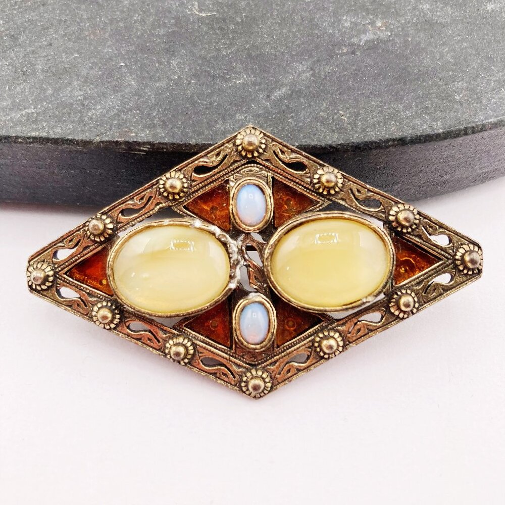 MIRACLE Vintage faux opal, yellow glass stone, and aged etched brass brooch pin
